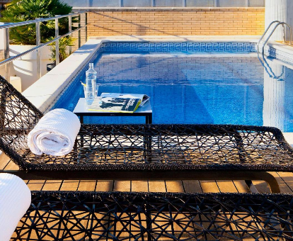 Piscina del hotel Claris con spa en Barcelona