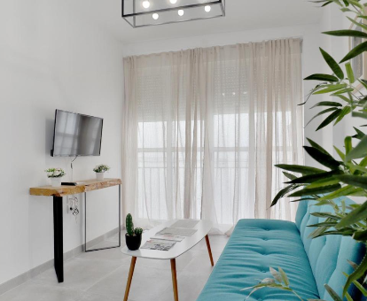 Zona de estar del lujoso apartamento que cuenta con servicio de spa llamado HiCityKey en Córdoba
